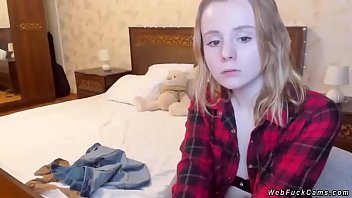 video of girl taking off bra